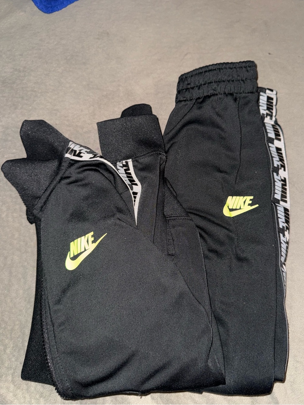 Nike Black Joggers with Neon Yellow Logo and Side Tape